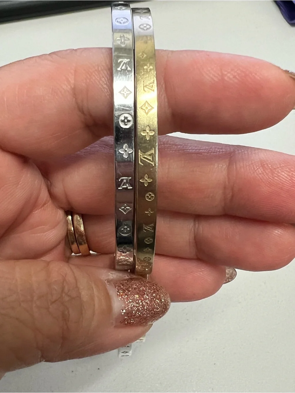 Chanel, LV, Gucci Stackable Silver and Gold Logo Bangle Set - Picture 8 of 16